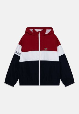 Lacoste: Белая куртка 