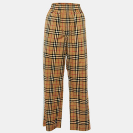 Burberry: Бежевые брюки 